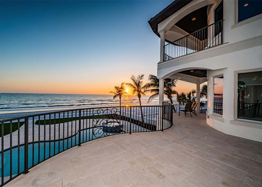 Luxury Beachfront Estate at Sunset